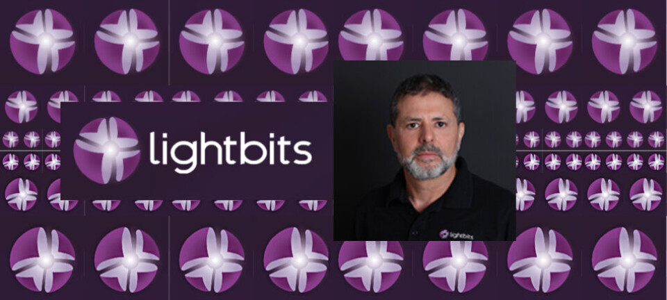 CEO Eran Kirzner framed by repeating Lightbits logo graphics
