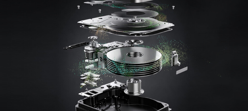Exploded diagram of hard disk drive parts floating above the open drive base